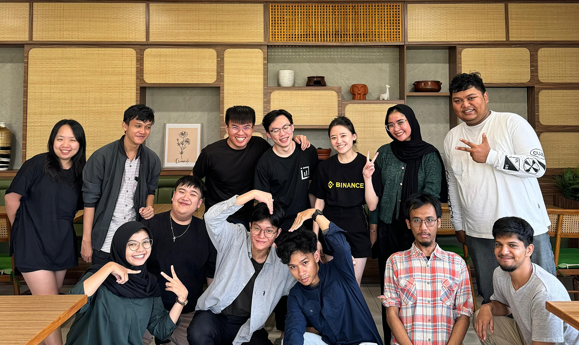 WidaTech team members posing together in a group