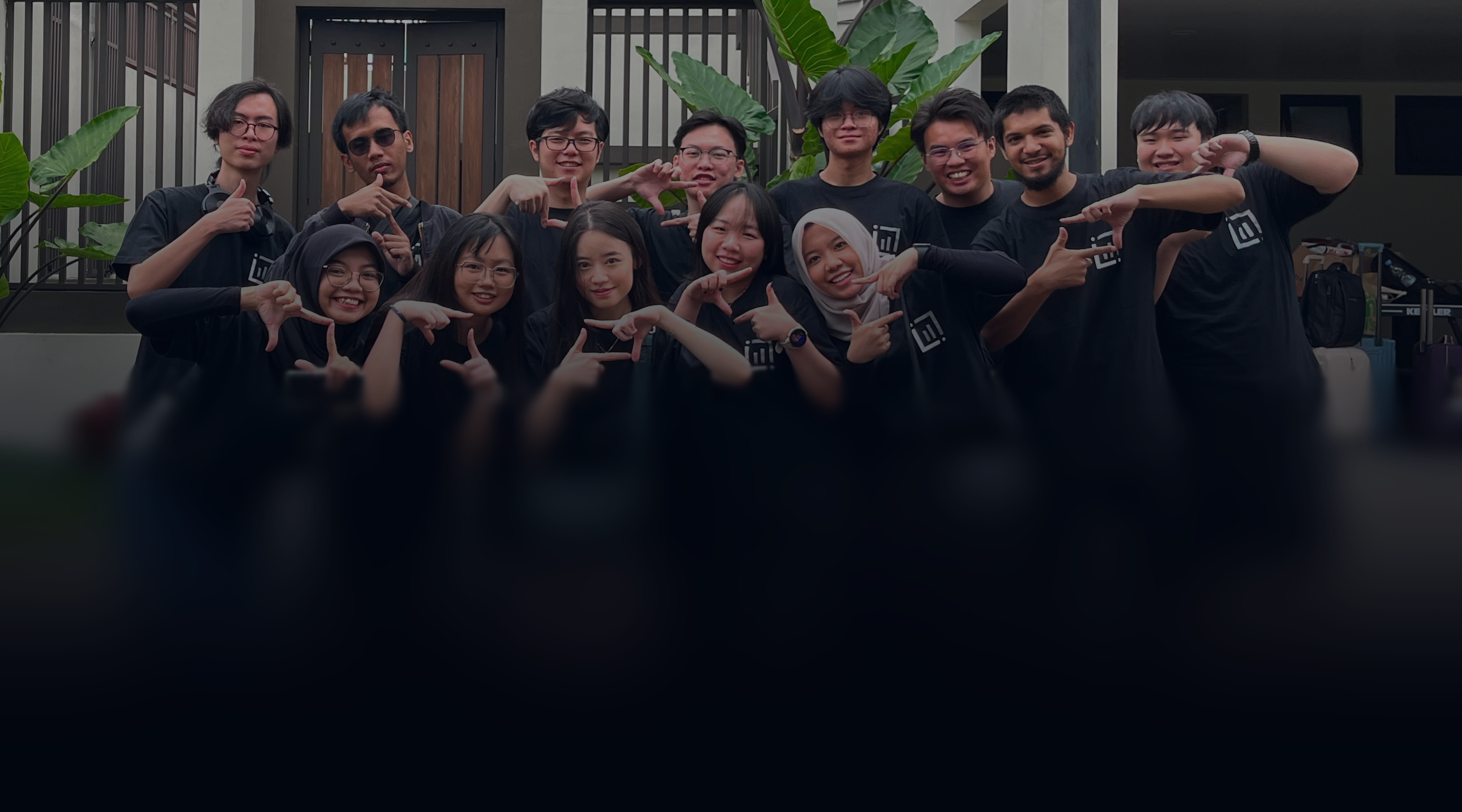 WidaTech team members posing together in the office